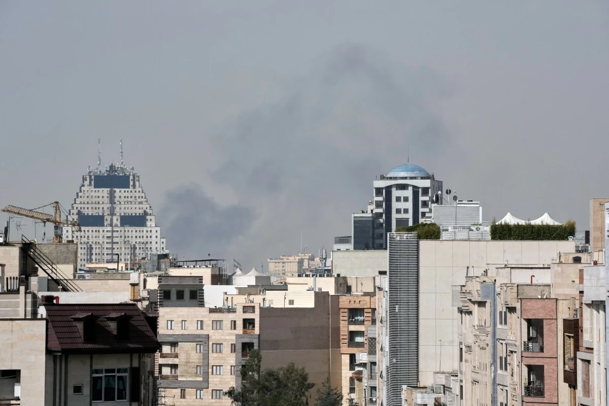 

SMOKE  rises on the skyline after an explosion in Tehran, Iran, Saturday, Feb. 28, 2026. (AP)
