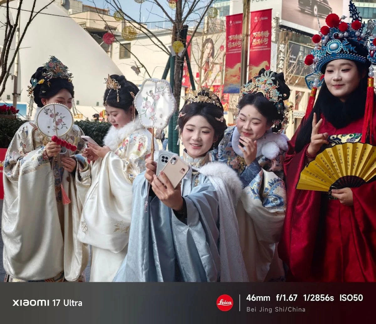 DRESSED UP. A group of friends takes a photo while in costume at the Wangfujing Street shopping district in Beijing.
