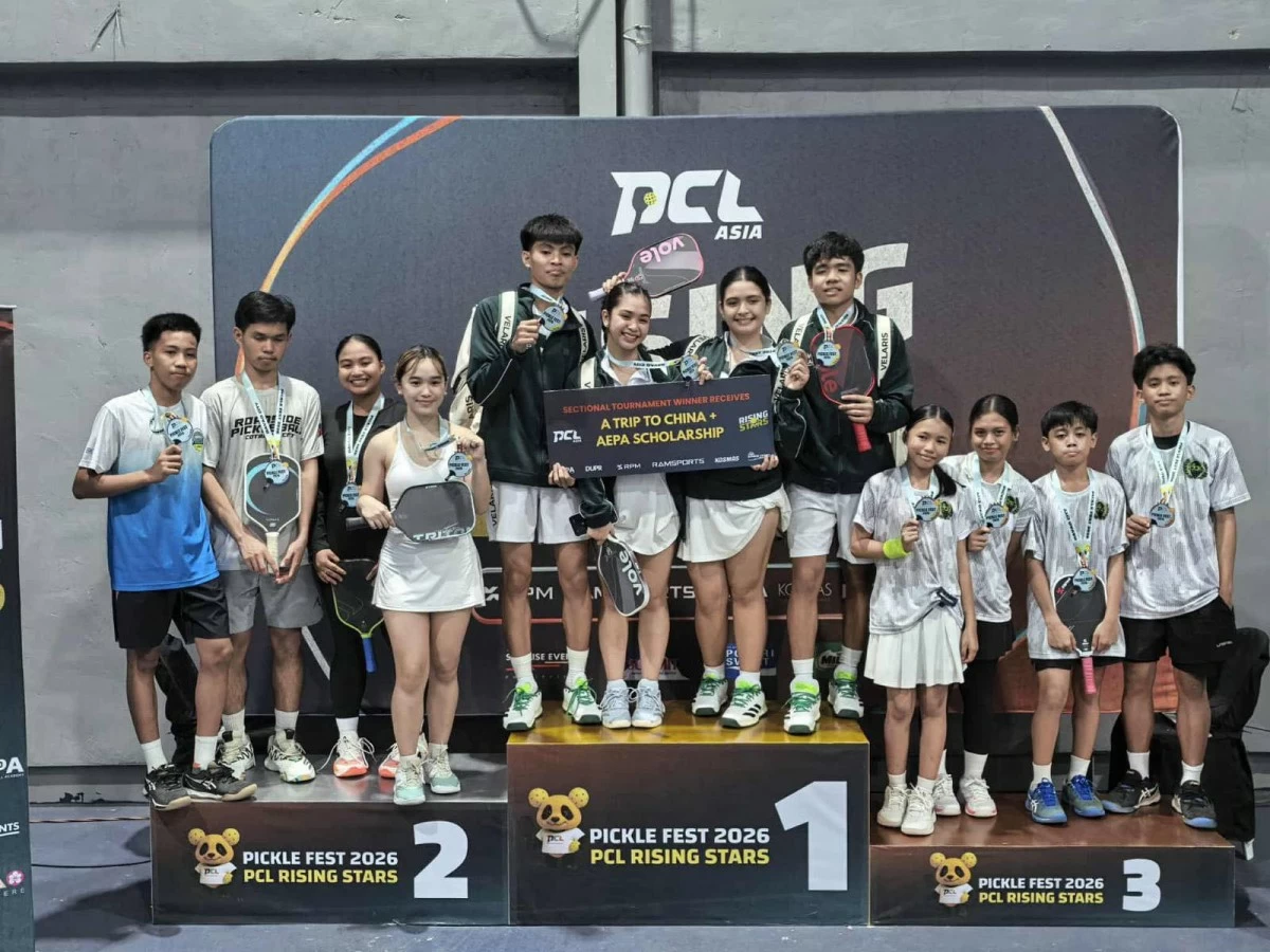 Team Velaris display their gold medals, replica of scholarship development grant, and ticket to the PCL Asia Grand Finals in China after ruling the PCL Rising Stars U19 Sectional Tournament in Davao over the weekend.