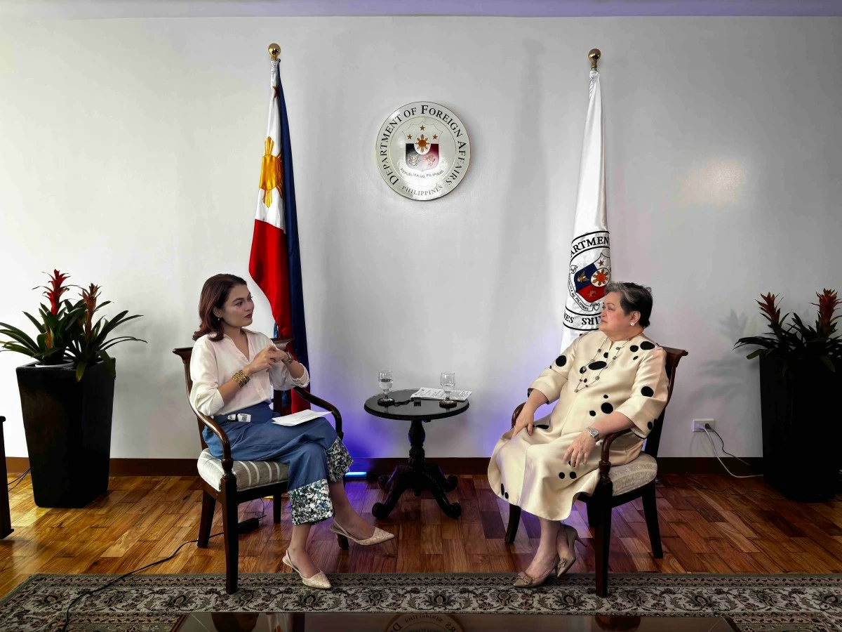 The author with Secretary Lazaro