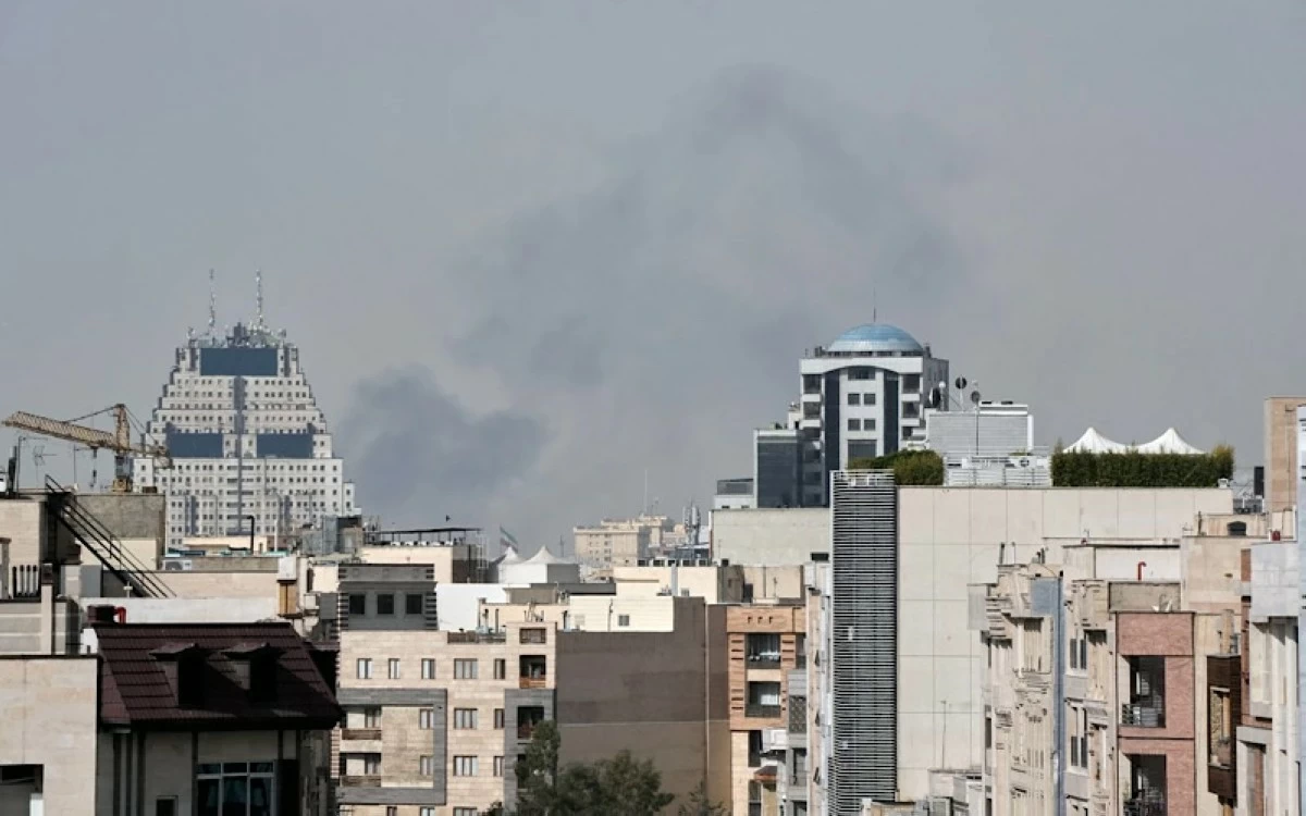 Smoke rises on the skyline after an explosion in Tehran, Iran, Saturday, Feb. 28, 2026. (AP)