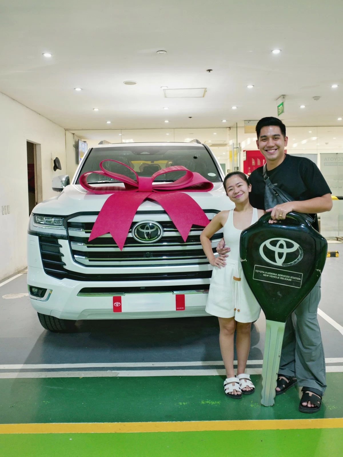 Kiray and Stephan pose with their newly purchased vehicle