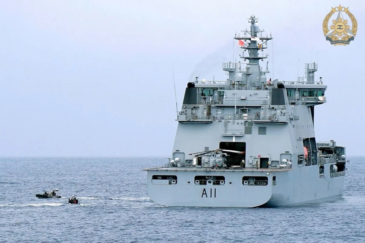 The Royal New Zealand Navy’s HMNZS Aotearoa (A11) is seen alongside two rigid hull inflatable boats (RHIBs), one from A11 and another from BRP Jose Rizal (FF-150), as they conduct a personnel exchange exercise during a Multilateral Maritime Cooperative Activity (MMCA) in the West Philippine Sea (WPS) on October 30, 2025. (Photo: Armed Forces of the Philippines)