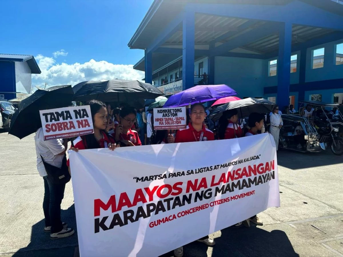 PEOPLE urge the DPWH to hasten the repair of two major roads in Gumaca, Quezon. 