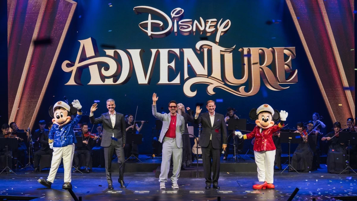 WELCOME TO ADVENTURE (From left) Captain Mickey Mouse, incoming The Walt Disney Company CEO Josh D'Amaro, Robert Downey Jr., Disney Signature Experiences president Joe Schott, and Cpt. Minnie Mouse christens the ship.