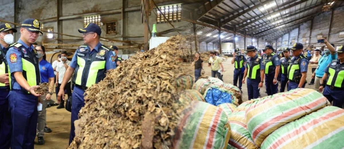 PNP chief Gen. Jose Melencio C. Nartatez, Jr. inspects the confiscated cigarettes and other materials in two separate sites in Pampanga. (photo: PNP)