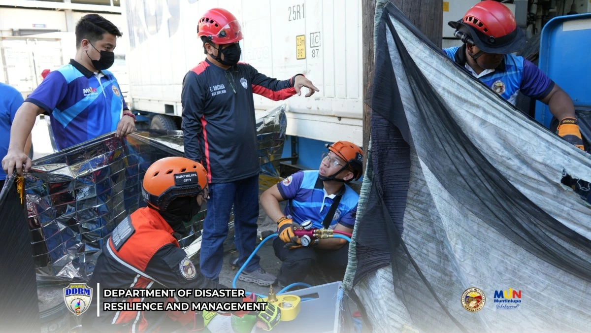 Personnel from the Muntinlupa City Disaster Reduction and Management Office at the accident area in Sucat, Muntinlupa (Photo from the Muntinlupa City Disaster Reduction and Management Office)  
