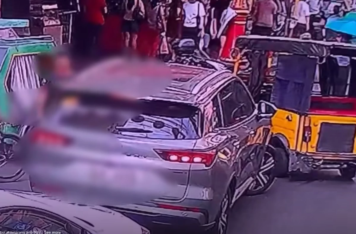 A Toktok driver allegedly blocks the path of an SUV during a road rage incident in Binondo, as seen in CCTV footage from Barangay 289, prompting authorities to investigate the confrontation. (Photo courtesy of Barangay 289 and Manila Police District)
