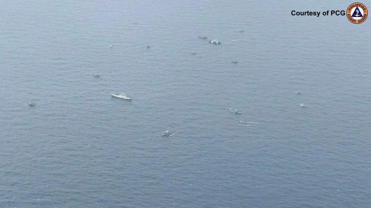 The Philippine Coast Guard (PCG) conducts an aerial patrol over Bajo de Masinloc in the West Philippine Sea (WPS) where at least 35 Filipino fishing boats are gathered to fish in their traditional fishing ground, on Feb. 23, 2026. (Photo: PCG)