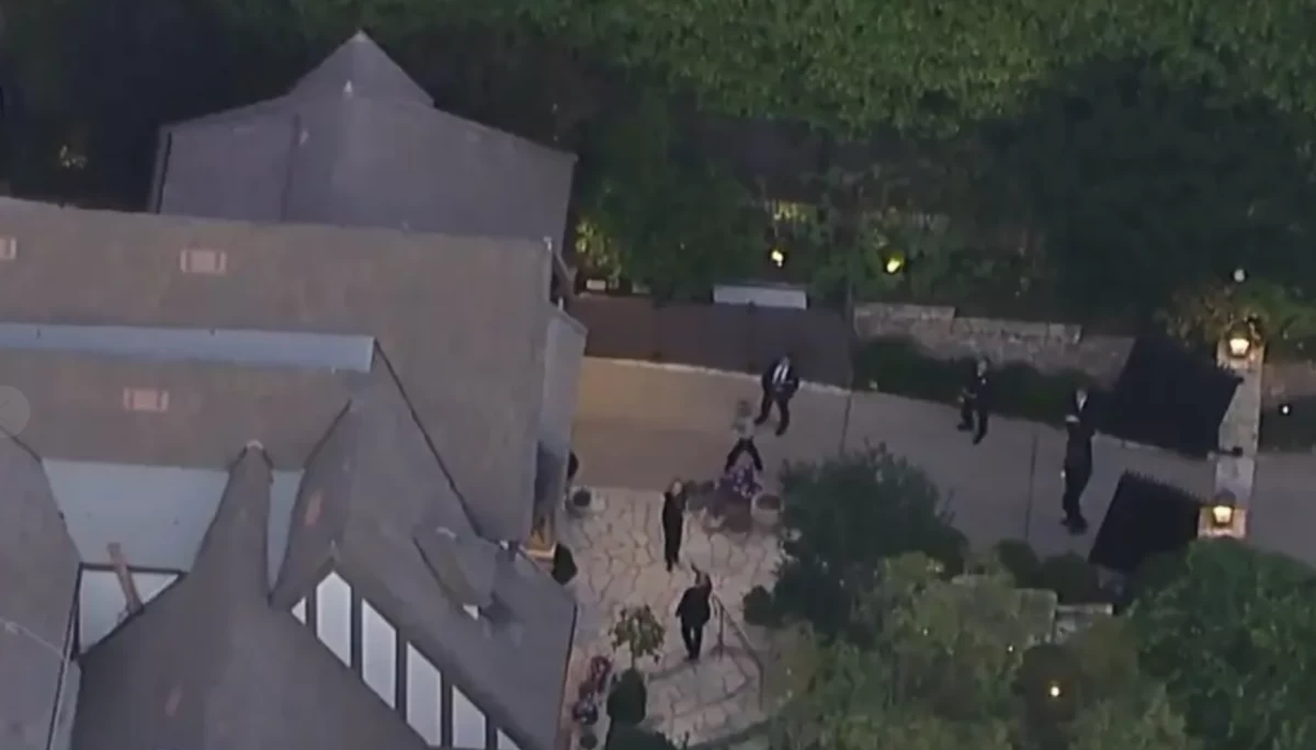 Los Angeles police took a woman into custody after she fired gunshots near the home of Grammy-award winning performer Rihanna, according to police and news reports. No one was injured, police said. 