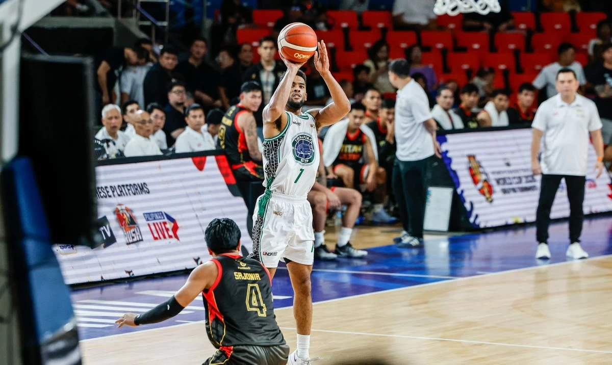 Jerrick Ahanmisi banners Terrafirma against Titan Ultra. (PBA Images)