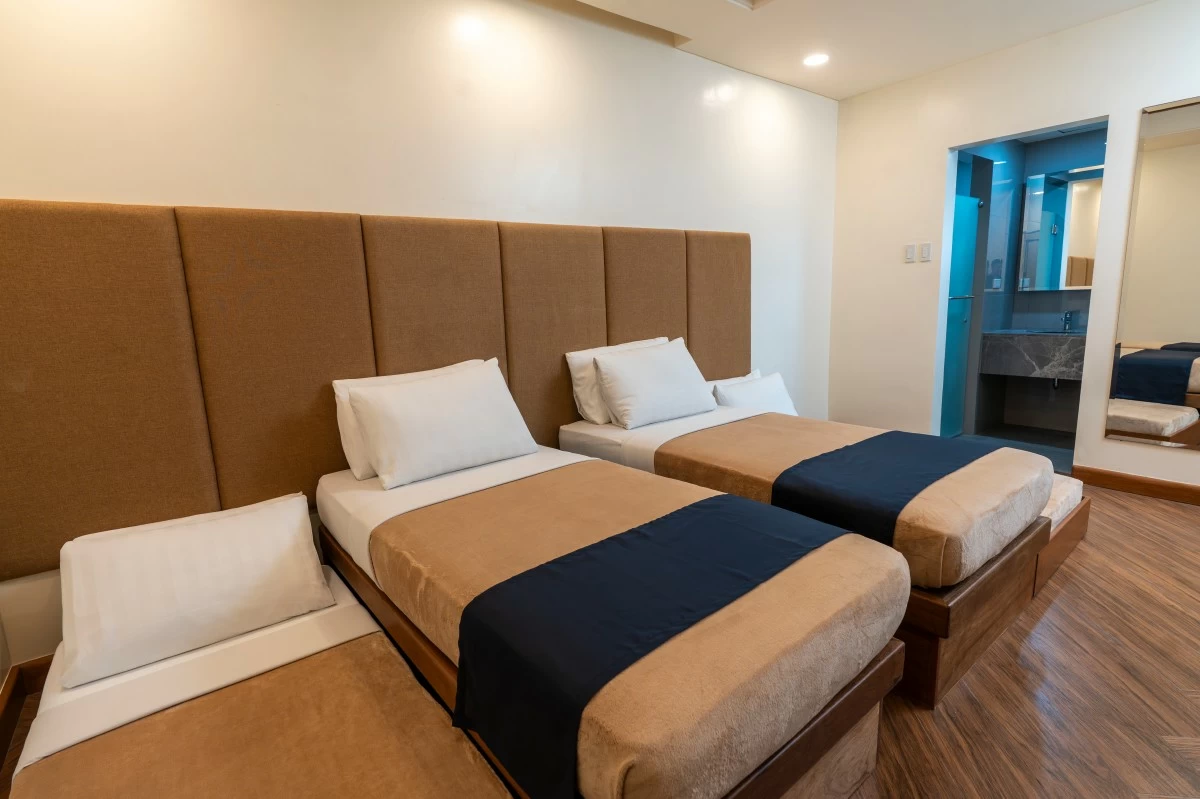 Kabayan Hotel Deluxe Room Quad