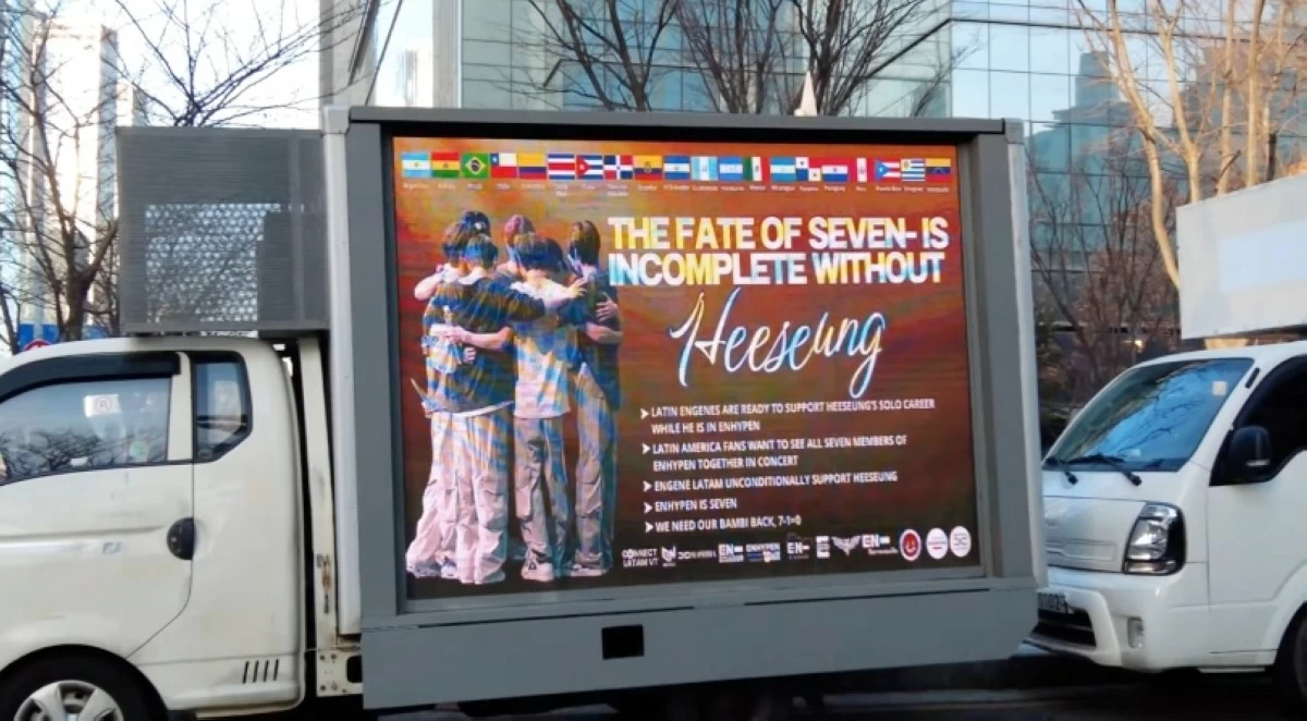 A protest truck for Heeseung outside the HYBE headquarters in Seoul (Screenshot from DonWorks video on YouTube) 