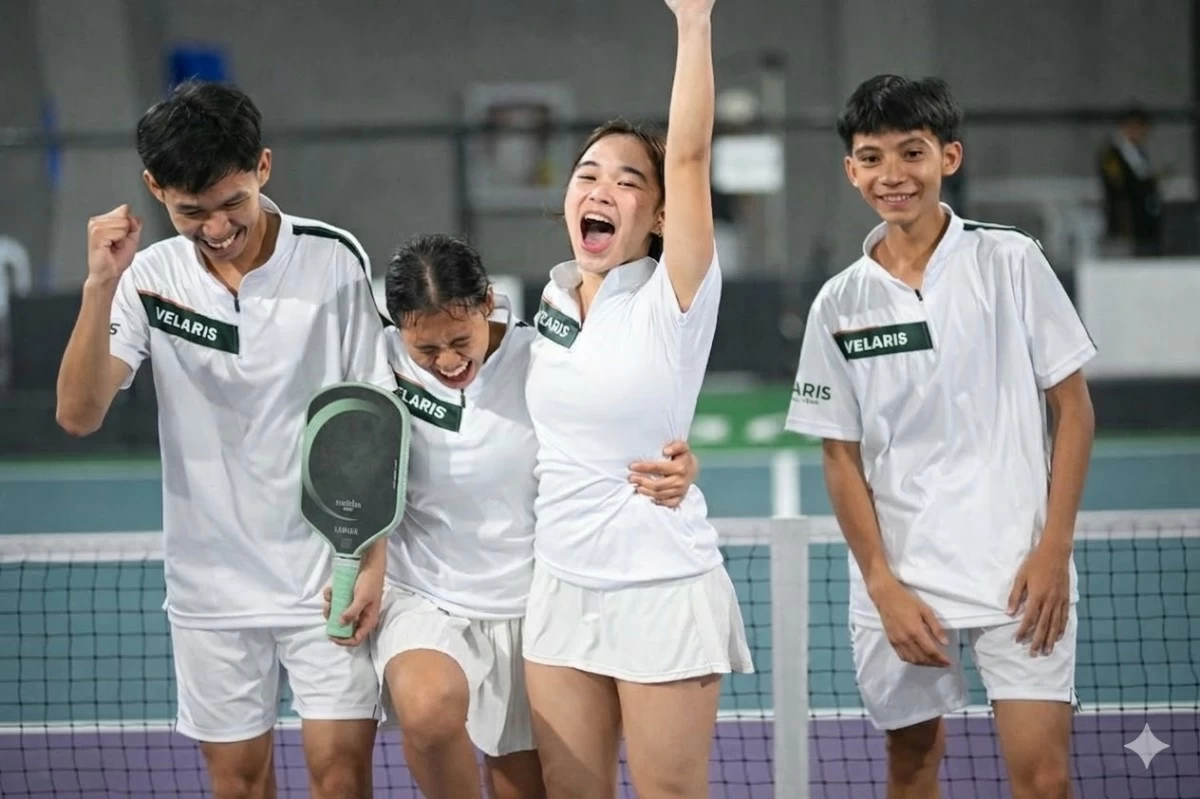Rose Bacaron raises her arm in triumph as Team Velaris – (from left) Alva Bual, Jean Indagacan and Sun Lacida – celebrates after capturing the PCL Rising Stars U19 crown in a thrilling finale.
