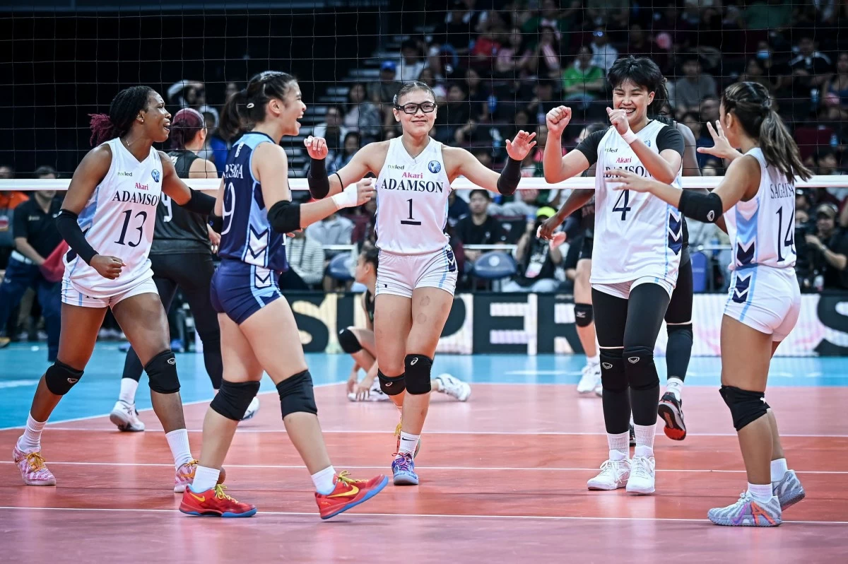 Adamson players celebrate after scoring a point against UP. (UAAP Media)