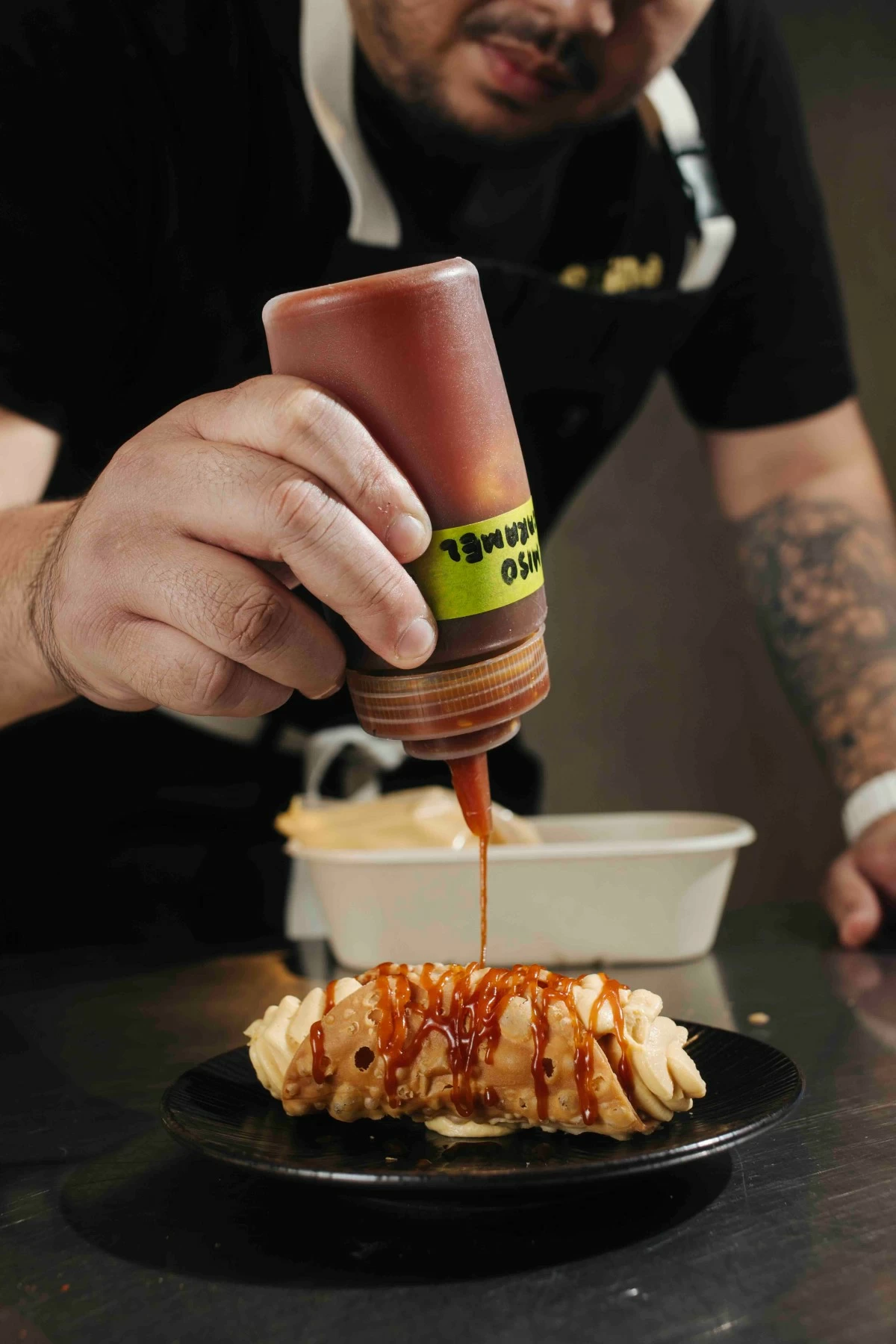 MISO CANNOLI Crisp cannoli shells filled with silky miso caramel cream.