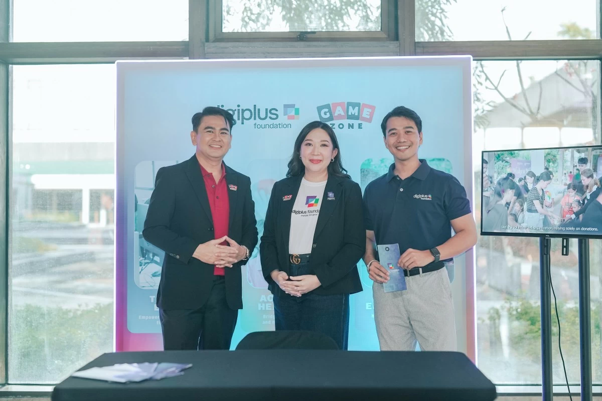 Rafael Jasper Vincencio, president of GameMaster Integrated Inc with Angela Camins-Wieneke, executive director of DigiPlus Foundation