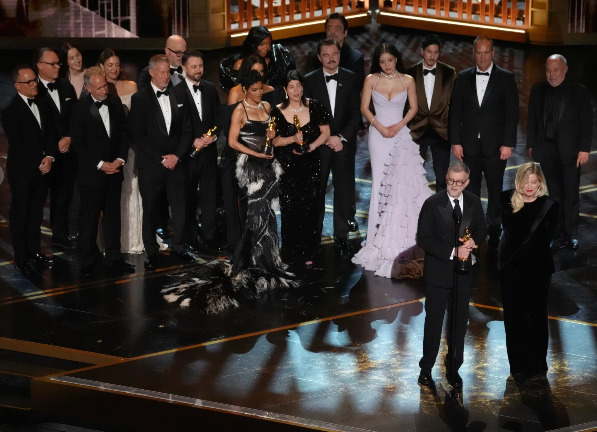 Paul Thomas  Anderson and Sara Murphy, together with the cast of 'One Battle After Another' accepts the award for Best Picture at the 2026 Academy Awards (AP)