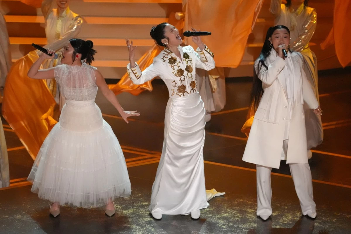 Rei Ami, from left, EJAE, and Audrey Nuna perform 'Golden' from 