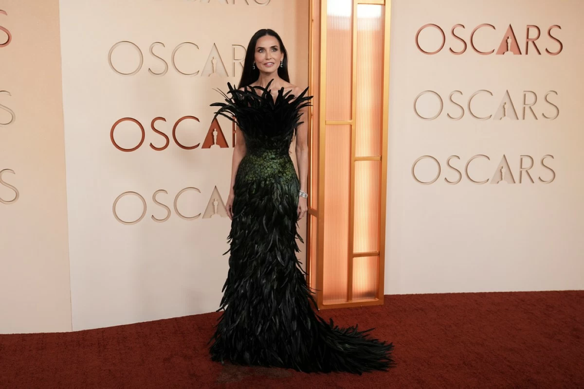 Demi Moore arrives at the Oscars on Sunday, March 15, 2026, at the Dolby Theatre in Los Angeles. (AP Photo/Gregory Bull)