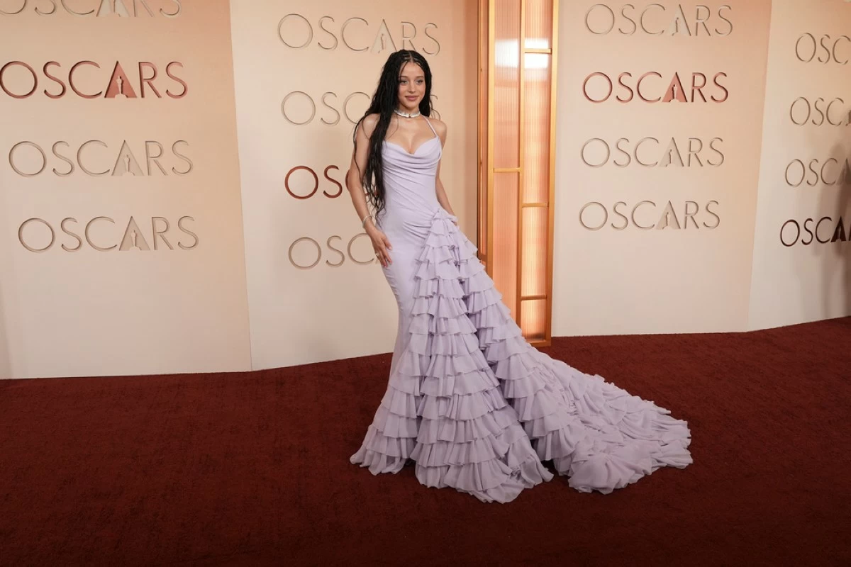 Chase Infiniti arrives at the Oscars on Sunday, March 15, 2026, at the Dolby Theatre in Los Angeles. (AP Photo/Gregory Bull)