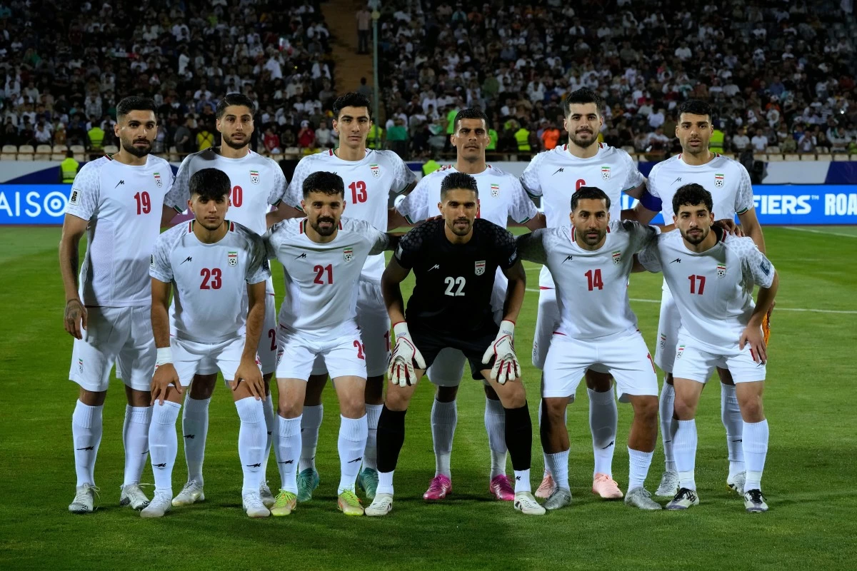 FILE - Iran's players pose for a team photo before an Asian group A qualifying soccer match against North Korea for the 2026 World Cup, June 10, 2025, at Azadi Stadium in Tehran, Iran. (AP Photo/Vahid Salemi, file)