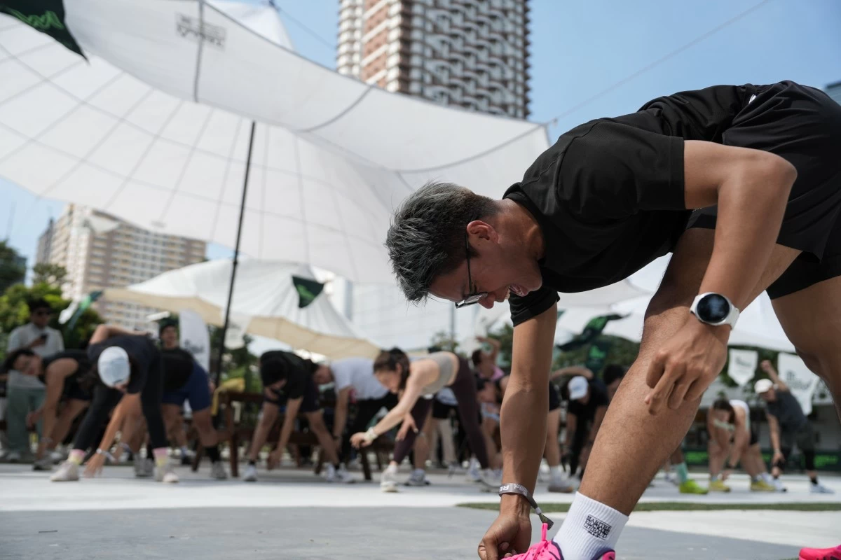 Stretching at the start of Fit Crawl 
