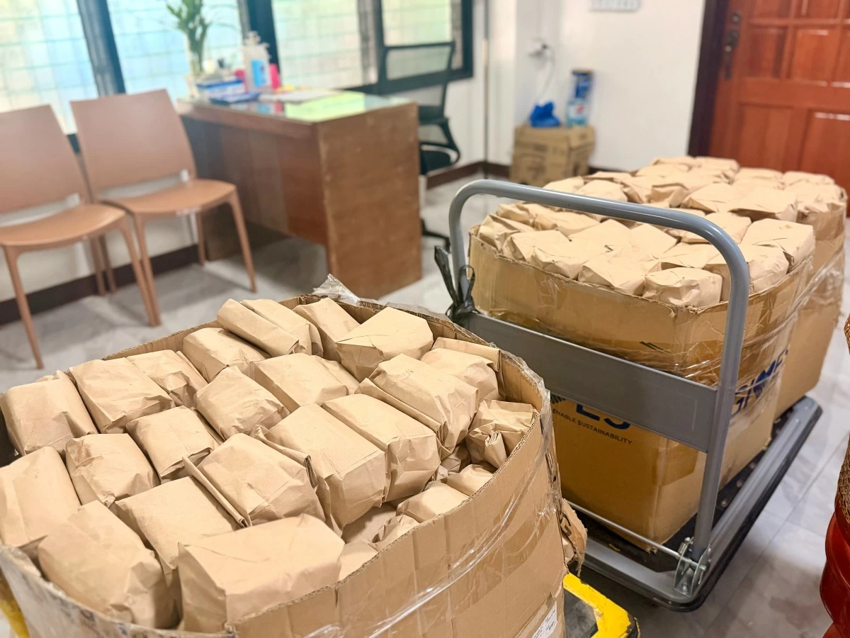 Hundreds of sandwiches are prepared each morning following Mass, packing food for distribution across PGH wards.