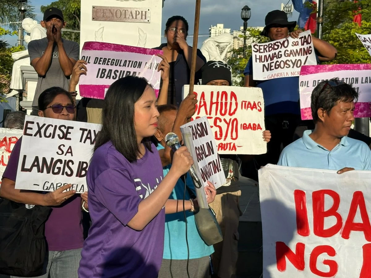 Gabriela Partylist Rep. Sarah Elago speaks during the protest at Plaza Bonifacio in Pasig City. (Photos from Gabriela Women’s Party)