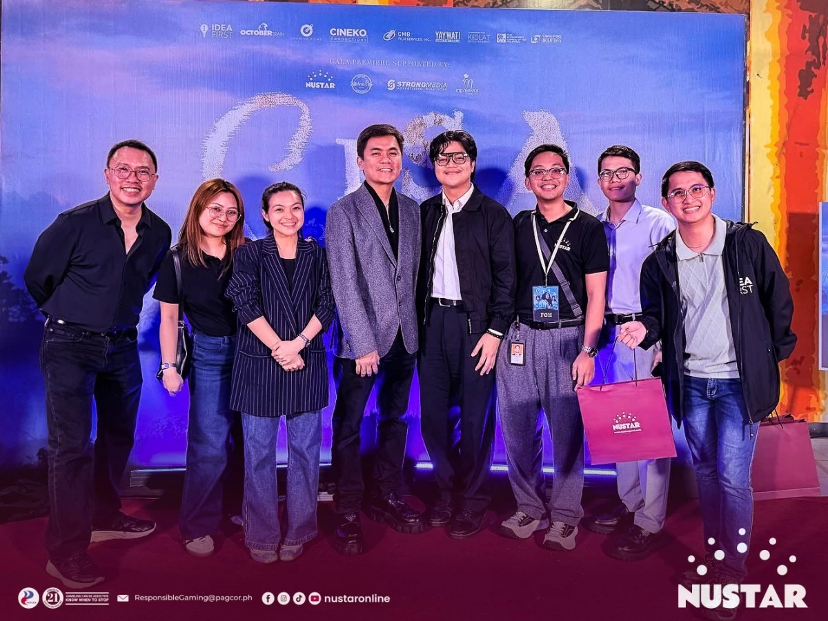 The NUSTAR Online team poses with producer Perci Intalan (far left), writer-director Jun Robles Lana (middle left), and business unit head Dave Gatdula (far right)