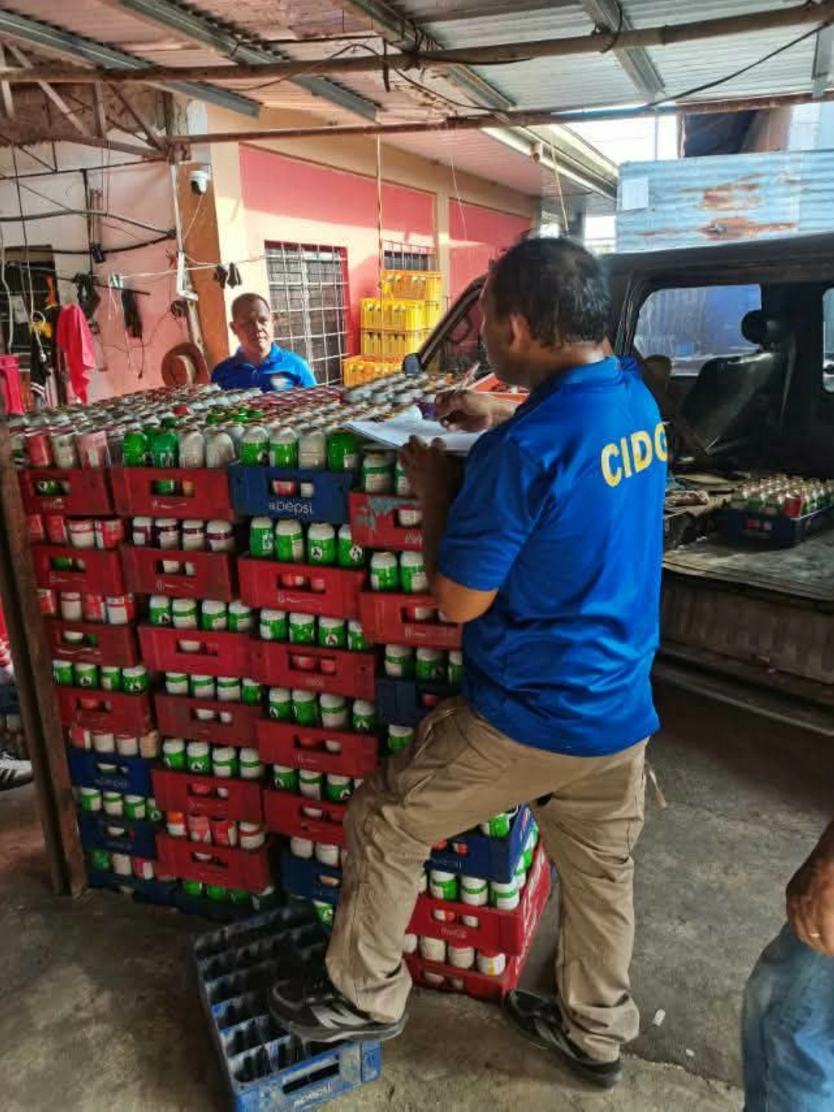 CRATES of alleged illegally-refilled butane canisters are seized in a police raid in Bogo City, Cebu. (CIDG-7)