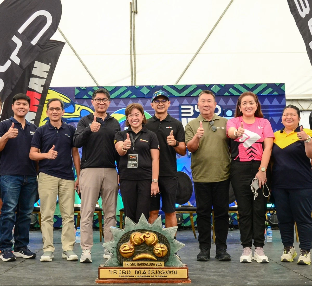 Officials of the IRONMAN 70.3 Davao give the thumbs-up, signaling full readiness for the return of Davao City as host of the premier endurance race Sunday. They are (from left) Joseph Derpo of RLC Residences, Davao Light and Power Co.’s Enriczar Tia, AC Mobility-BYD’s Dino Obias, Sunrise Events, Inc.’s Princess Galura, IRONMAN Asia Region Head of Operations CG Lim, Walter Alvarez, Faye Alonzo, and Eunice Aton.
