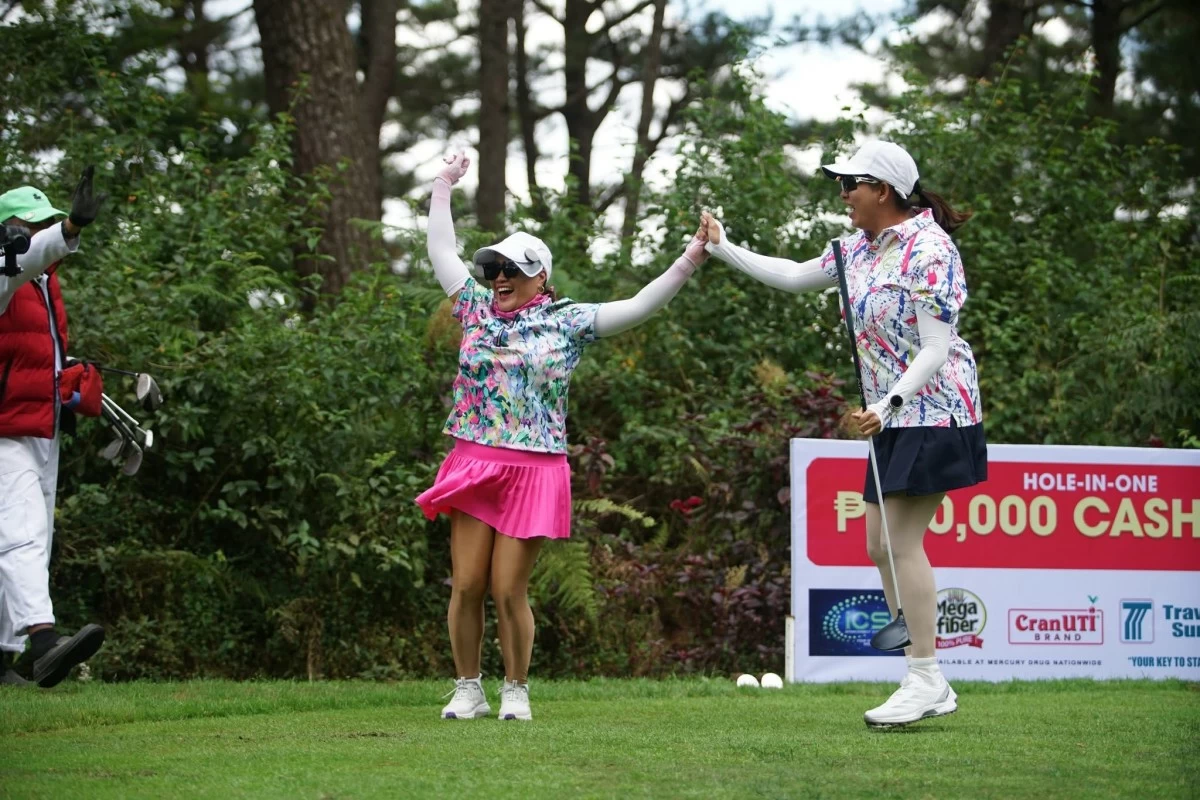 Cathy Neish celebrates after acing Hole No. 4 of the John Hay Golf during the 28th Corporate Cup. (JHG photo)