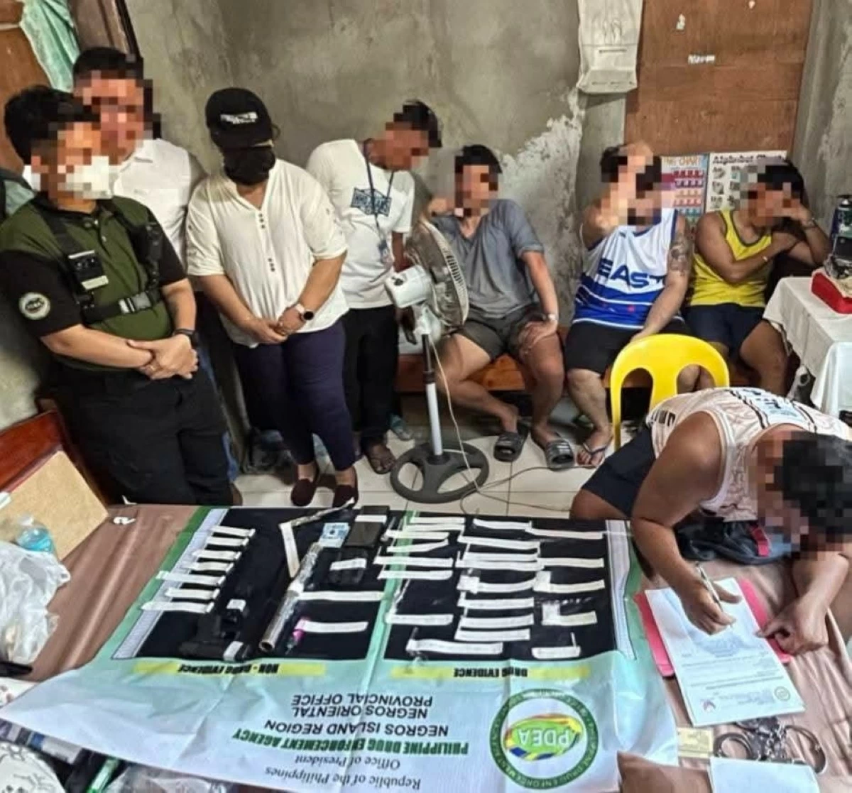 
A BARANGAY councilor was among those arrested in a drug den in Barangay Poblacion, Santa Catalina, Negros Oriental on Friday, March 20. (PDEA-NIR)
