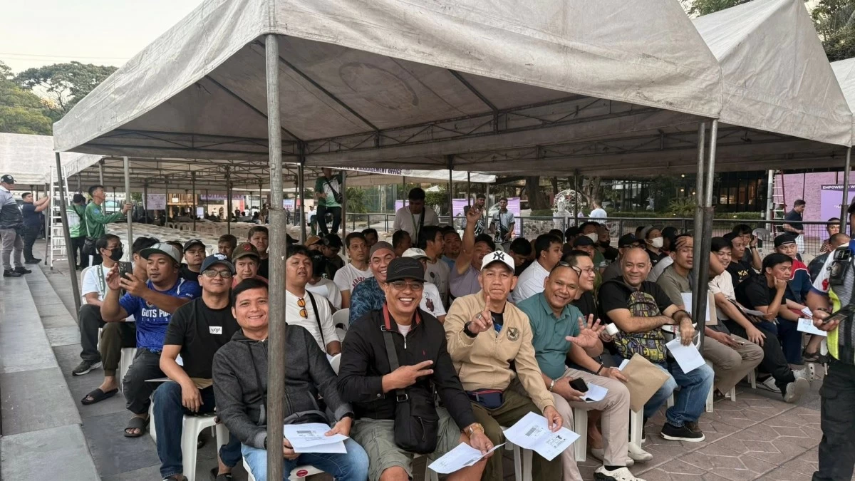 TNVS drivers await for their turn to receive the P5,000 fuel subsidy being distributed at Kartilya ng Katipunan in Manila on Tuesday, March 24. (Photo from Manila PIO)