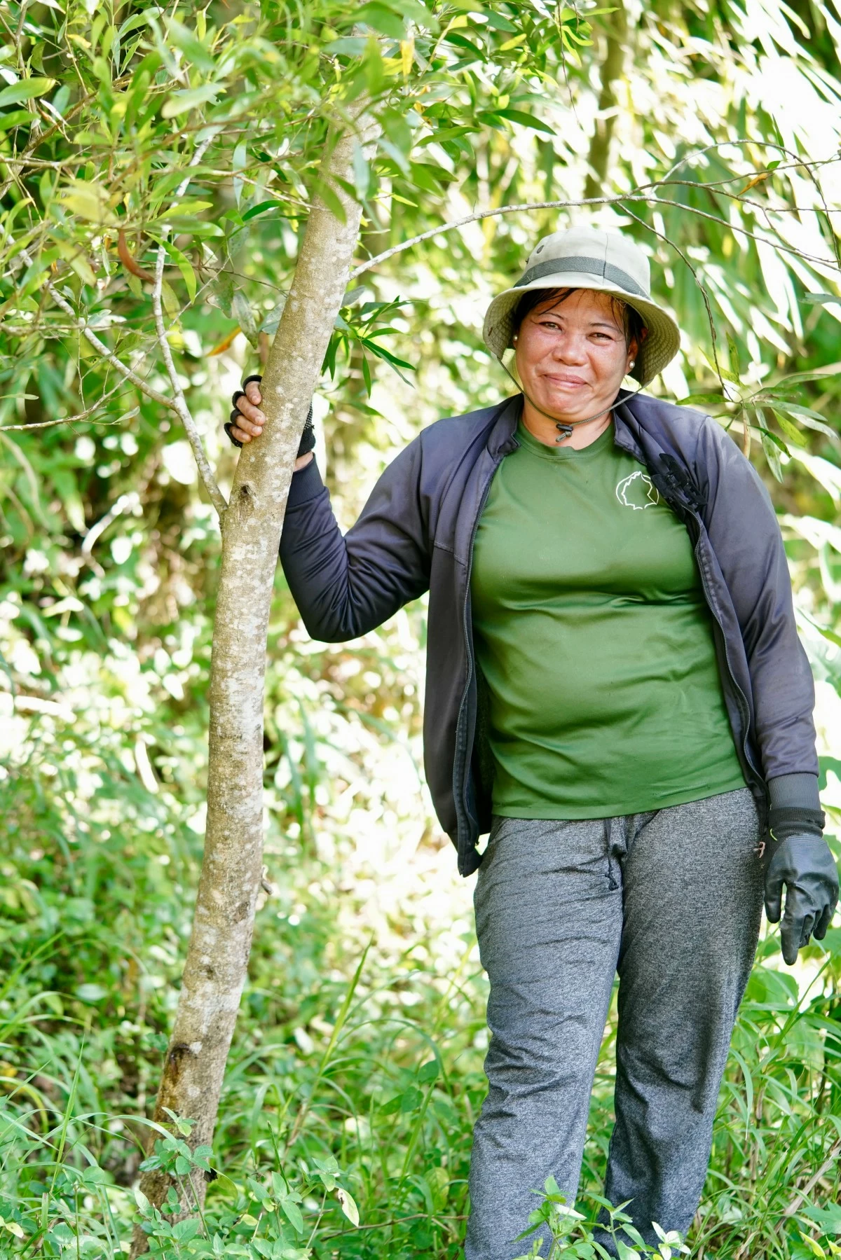 A female park ranger tends to her area.