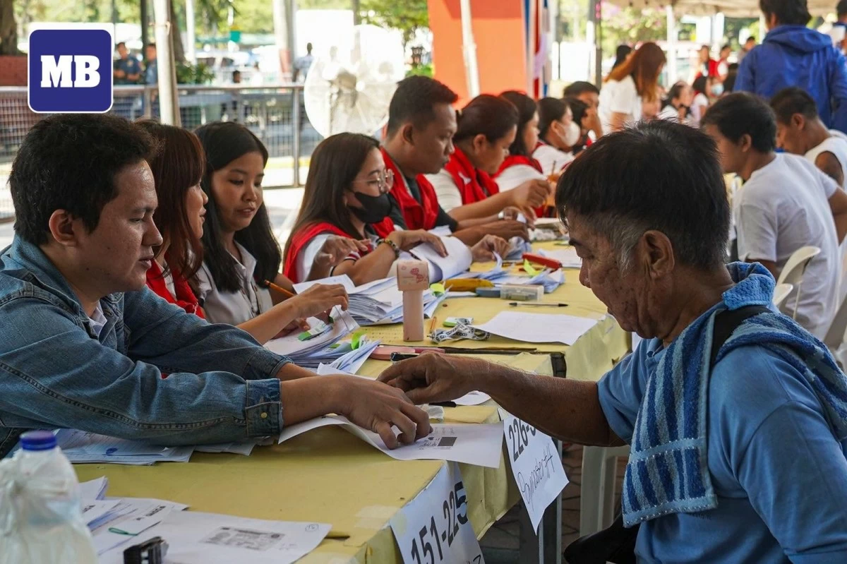 Jeepney drivers line up to receive a P5,000 fuel subsidy from the Department of Social Welfare and Development on Wednesday, March 25, at Kartilya ng Katipunan in Manila. The aid is part of the government’s program to ease the burden of rising fuel costs, following President Ferdinand R. Marcos Jr.’s directive. (Photo taken by John Louie Abrina/MANILA BULLETIN)