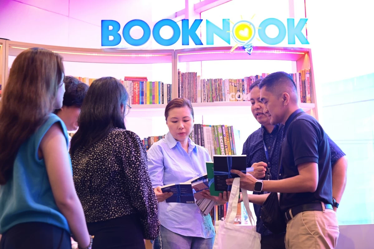 Ateneo representatives gather at Book Nook, SM North EDSA, sharing conversations around newly donated research journals and bringing learning closer to the community.