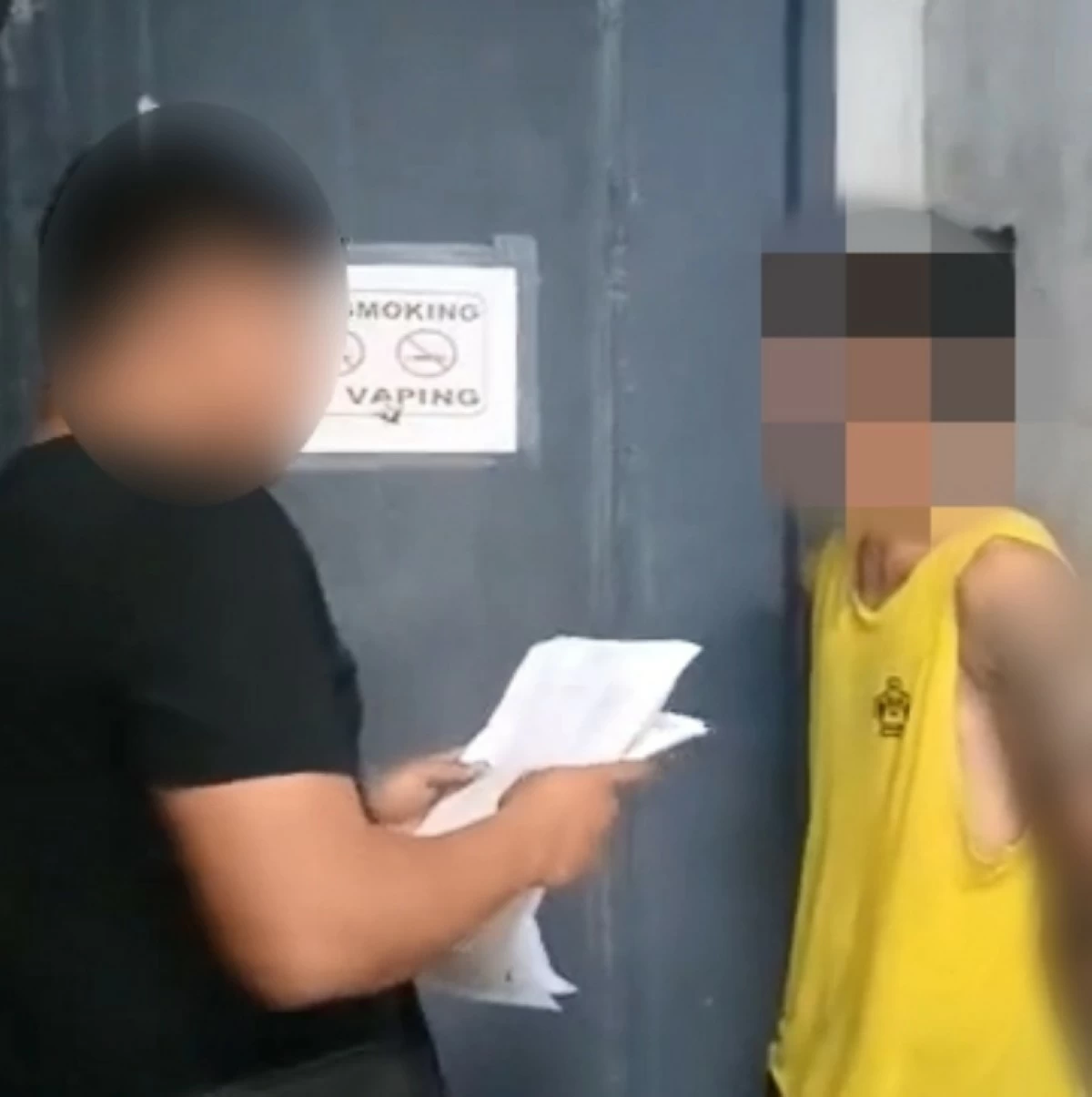 The man (right) arrested by the Muntinlupa police on March 26 (Photo from Muntinlupa police / SPD) 