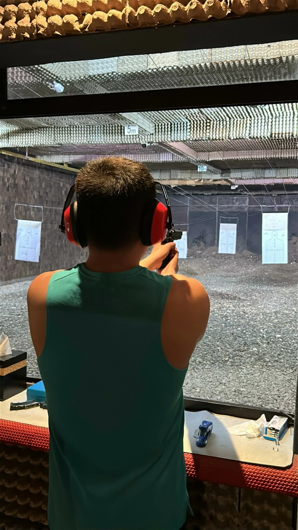 SHARP FOCUS The author trying the indoor shooting range for the first time (Photo by Feliciano Rodriguez III | Manila Bulletin)