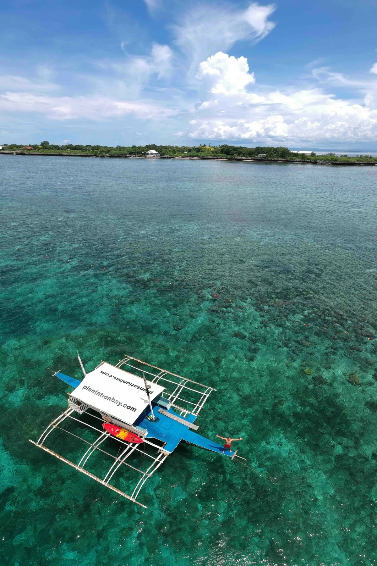 OPEN WATER A day out to sea, with snorkeling stops and a stretch of sand that slowed everything down. (Photo courtesy of Plantation Bay)