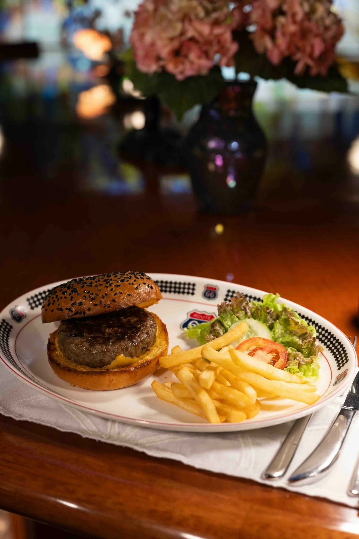 SIGNATURE BITE A house burger done right, built for guests with a healthy apettite. (Photo courtesy of Plantation Bay)
