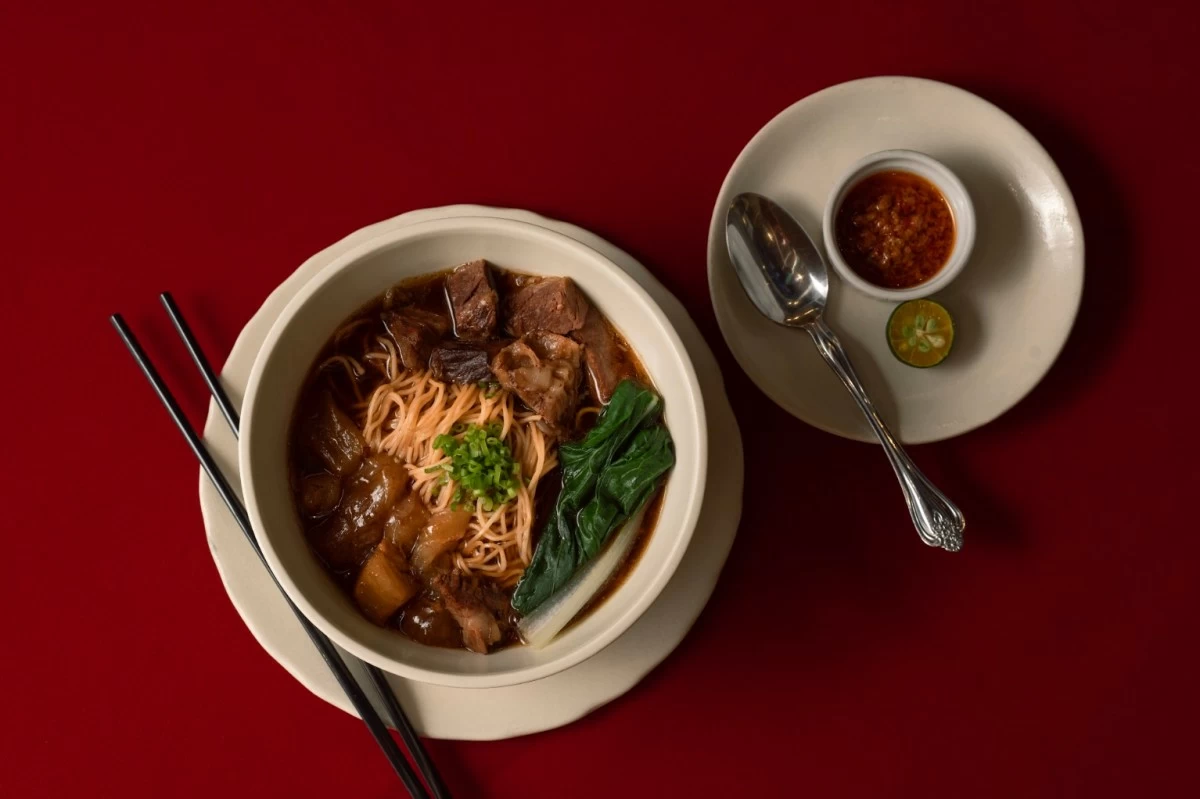 Beef brisket and tendon egg noodles, finished with calamansi oil
