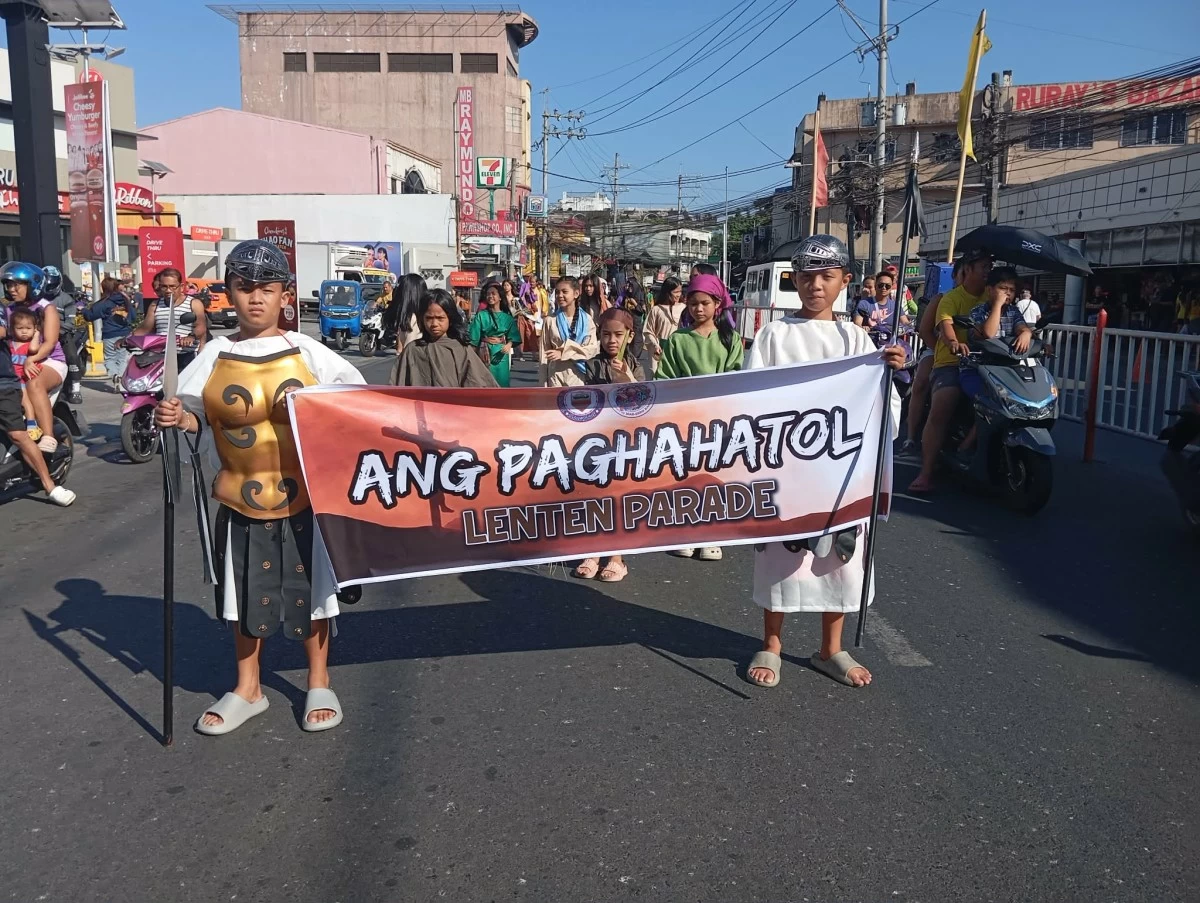 Kids hold the banner in Angono's Grand Lenten parade 2026 (Photos by Nel Andrade)