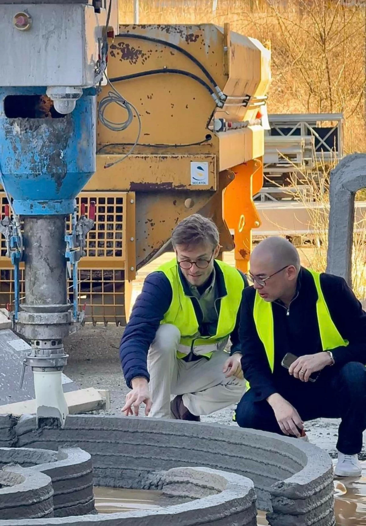 The construction firm uses a robotic system that follows digital models to layer concrete and build walls with precise dimensions. (Photo courtesy of Buensalido PR)