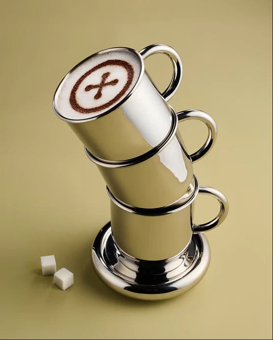 Stainless steel mug and button saucer set (Photo courtesy of West Elm)