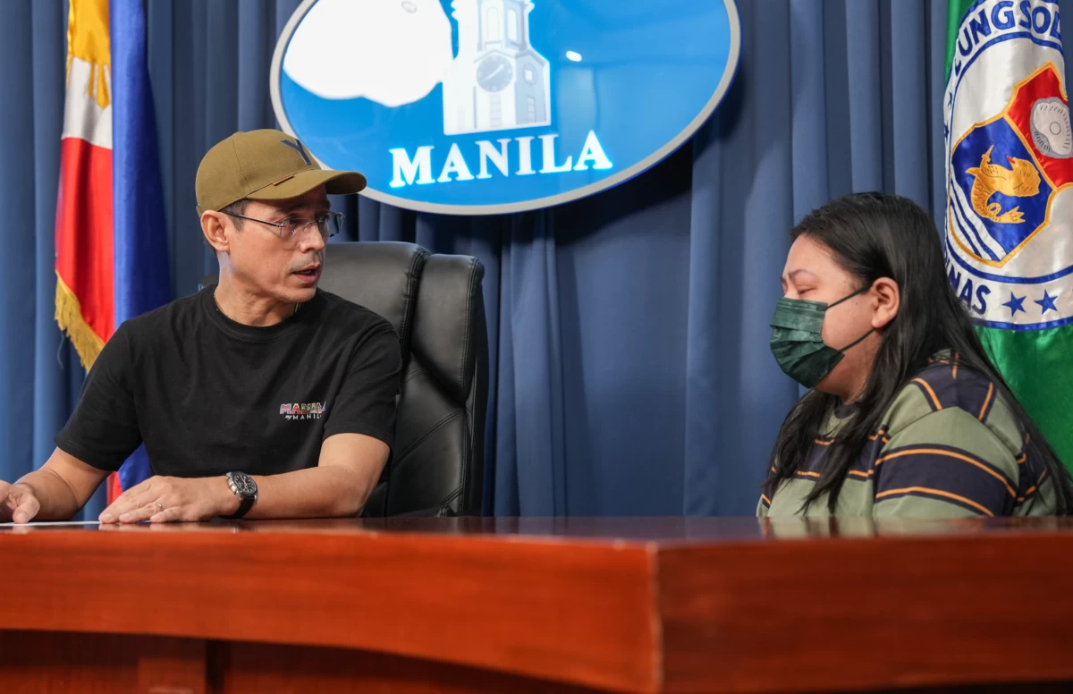 The 25-year-old robbery victim from Navotas City recounts her ordeal after being held at knifepoint while stuck in traffic along Road 10 in Tondo, Manila on April 6. The incident, captured on video, later went viral and led to the arrest of two suspects. (Photo courtesy of ManilaPIO)