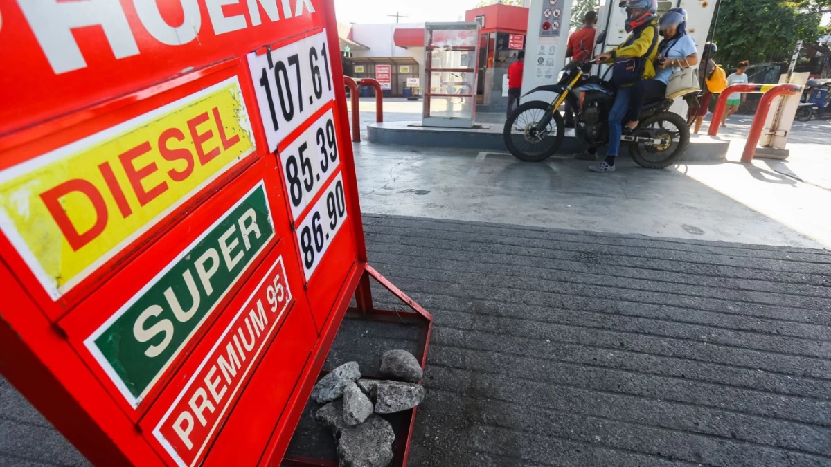 Fuel prices at a gas station in Davao City show a significant jump on Tuesday, March 17. Local motorists are feeling the pinch as oil companies implement a "big-time" price hike across the board. (Photo by Keith Bacongco I MB)
