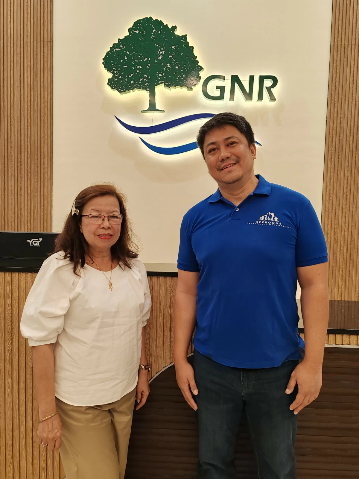 Christian Guballa, AHM managing director, with Marites Castro, DOT Region IV-A regional director.