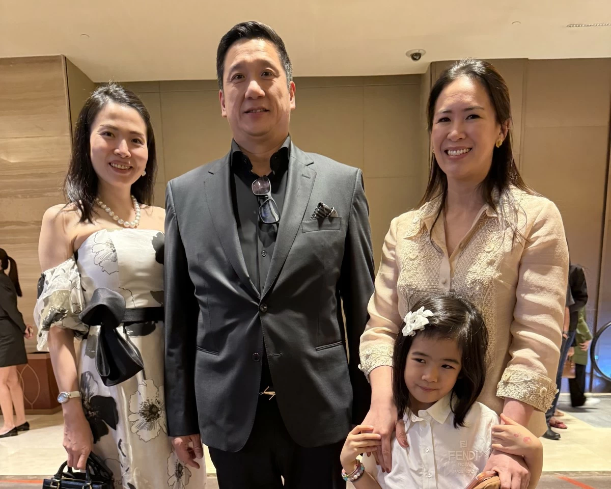 Mrs. and Mr. Benny Techico, with Kathryn Yu-Pimentel and daughter